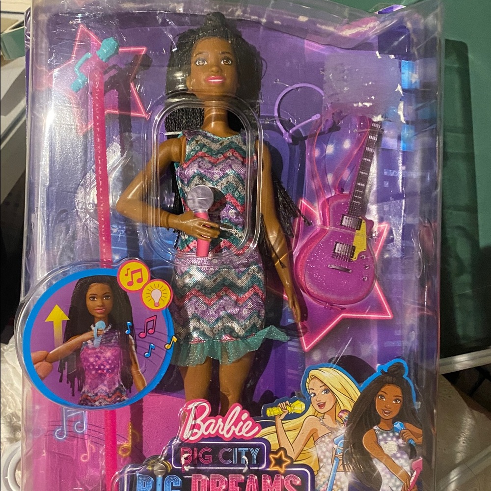 Barbie Doll in Teal and Pink Patterned Dress with Purple Guitar Sings
